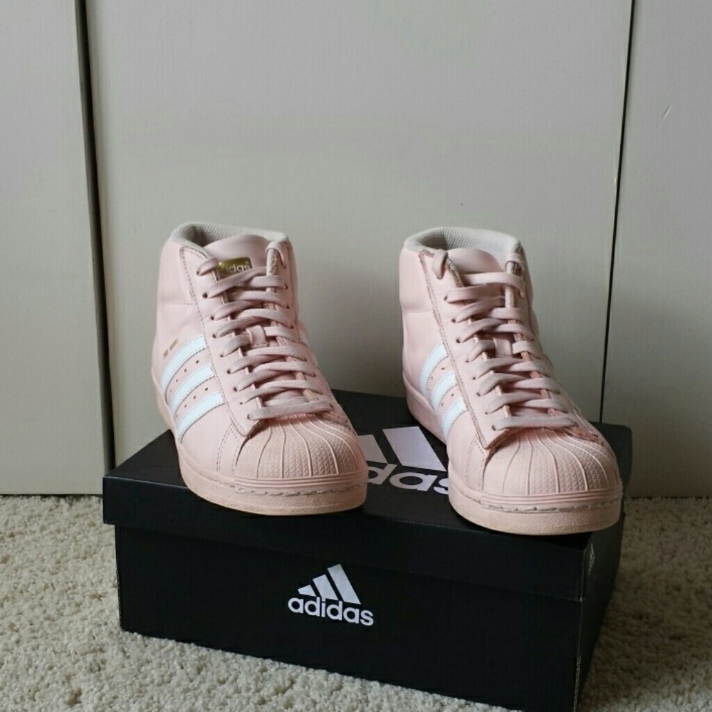 Blush pink Adidas high top basketball shoes